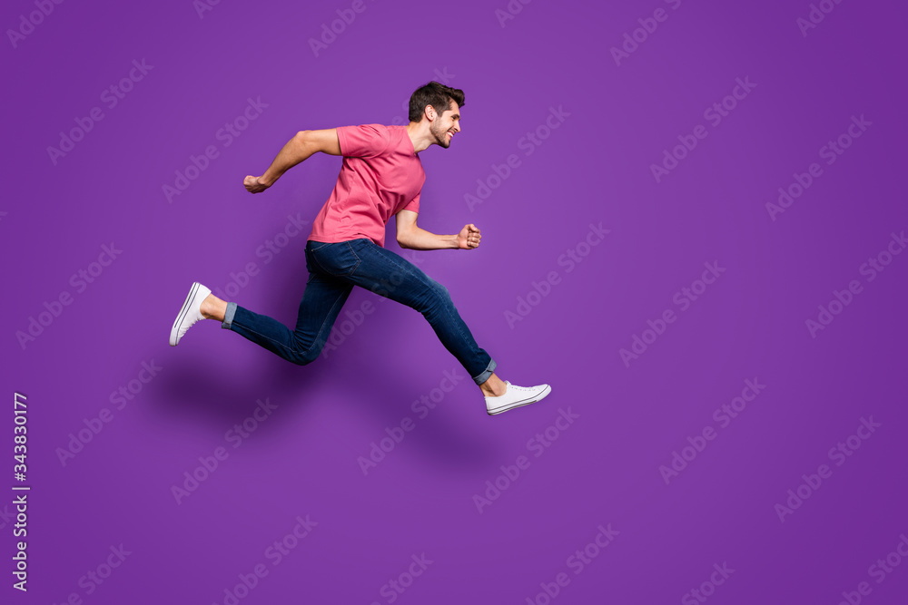 Full length profile side photo of cheerful energetic guy jump run after season spring lucky discount wear good look outfit footwear isolated over bright color background