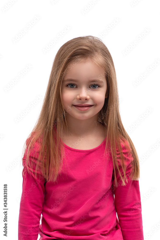 Studio shot of a cute blonde smiling girl with long hair and blue eyes, isolated Studio shot of a cute blonde smiling girl with long hair and blue eyes, isolated
