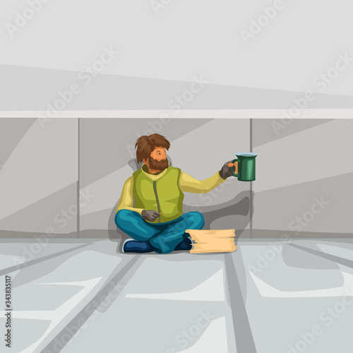 homeless sitting at grey wall