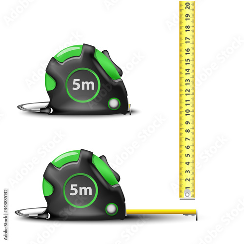 green Retractable steel measuring tape with imperial and metric measurements isolated on white background
