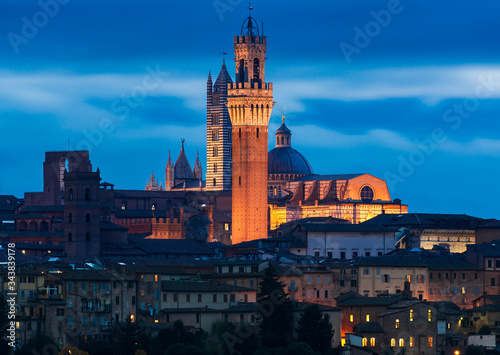 the skyline of Siena at dusk