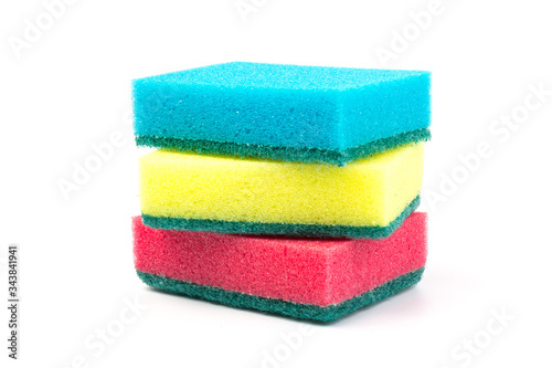 Colored sponges for washing dishes and other domestic needs, isoleted on white background