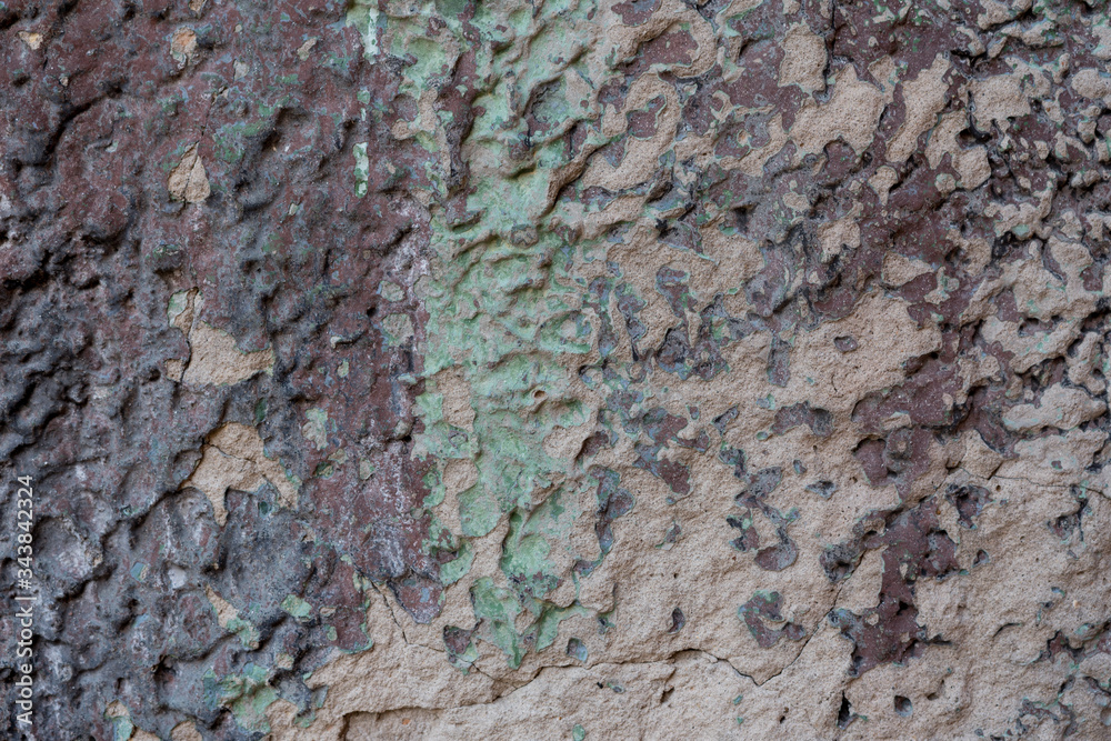 Close-up - gray stone wall in the old facade of the house Close-up - gray stone wall in the old facade of the house