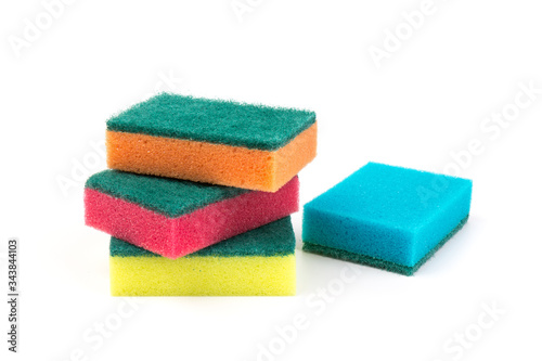 Colored sponges for washing dishes and other domestic needs, isoleted on white background