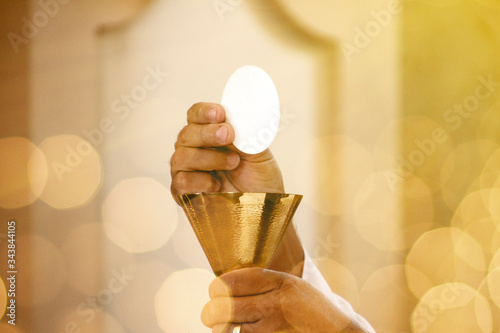 Consecration of bread and wafer wine photo