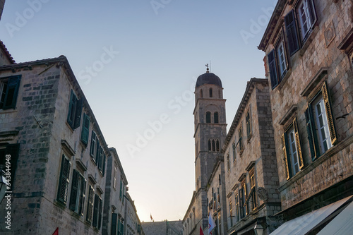 The evening sun illuminates the windows of houses in the old town of Dubrovnik, Croatia