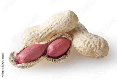 Raw peanuts isolated on white background with clipping path
