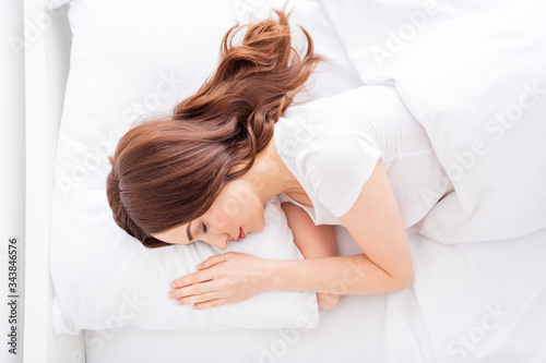 Top above high angle view close-up portrait of her she nice attractive healthy lovely charming red haired girl lying in bed sleeping in modern white light interior room house apartment indoors