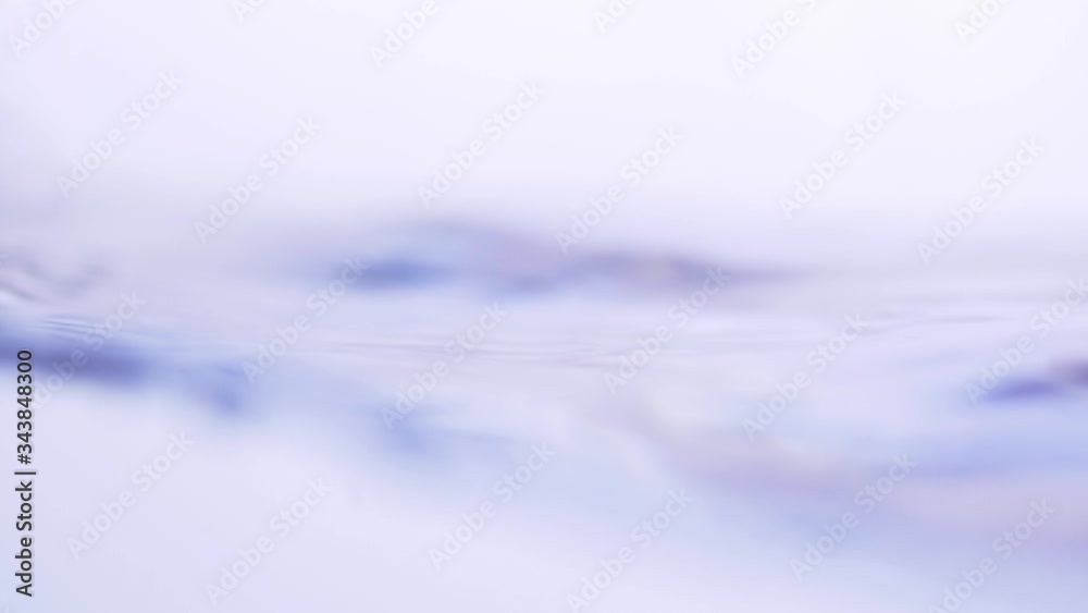 Water splash surface filling the frame with slow motion the water drop and waving liquid with an air bubble on a white background. 1080p 23.98fps Water splash surface filling the frame with slow motion the water drop and waving liquid with an air bubble on a white background. 1080p 23.98fps