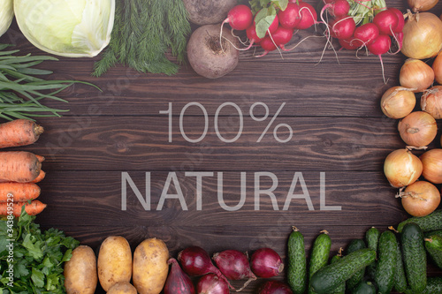 Fresh vegetables on a wooden background, frame of fresh vegetables