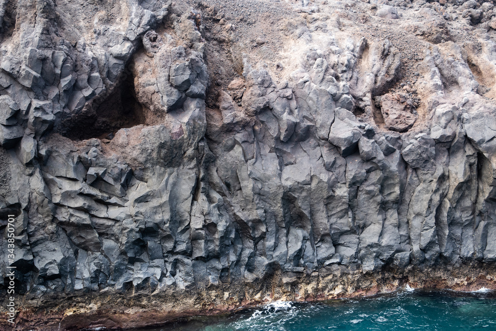 volcanic lava rock cliffs