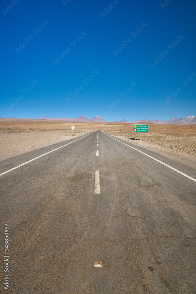 Road to the Chaxa Lagoon & Flamingos National Park. Pedro de Atacama, Antofagasta - Chile. Desert. Andes Range. Road to the Chaxa Lagoon & Flamingos National Park. Pedro de Atacama, Antofagasta - Chile. Desert. Andes Range.