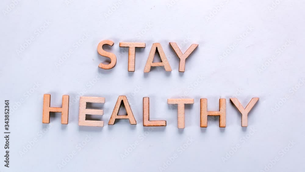 The word, Stay Healthy, made of dancing letters on a white background. The fight against coronavirus infection COVID-19. Matting inscription. The word, Stay Healthy, made of dancing letters on a white background. The fight against coronavirus infection COVID-19. Matting inscription.