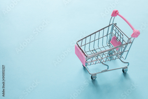 Shopping cart on a blue background