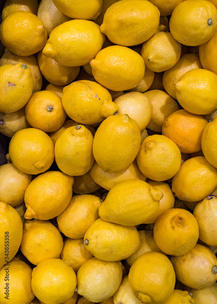 Pile of fresh lemons at a grocery store