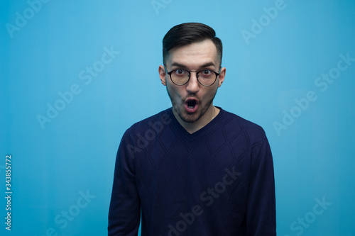 Portrait of an emotional young man in glasses © pavel_shishkin