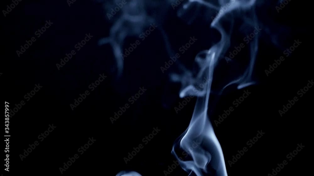 Real smoke on a black background. Thin Flexible Trickle of Real Smoke. Colorful real smoke rises up. Ideal for background or over-layer with blending mode add, screen, lighten. Real smoke on a black background. Thin Flexible Trickle of Real Smoke. Colorful real smoke rises up. Ideal for background or over-layer with blending mode add, screen, lighten.