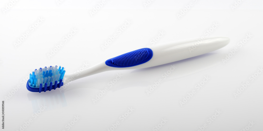 Toothbrush on a white background, close-up Toothbrush on a white background, close-up