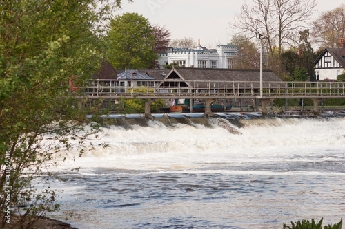 fast flowing water at the weir Boulters Lock Maidenhead photo