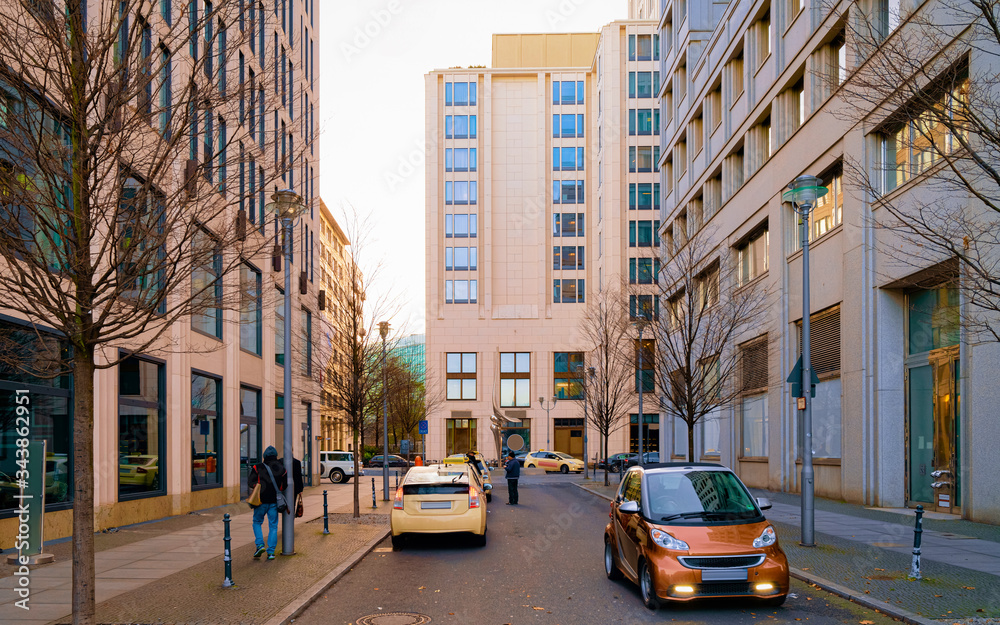 Street with cars and modern architecture in Potsdamer Platz reflex