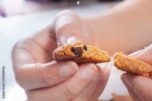 Chocolate Chip Cookies with Milk on baking Add butter . Stack of tasty Cookies Fresh pastries for Snack Breakfast every morning .