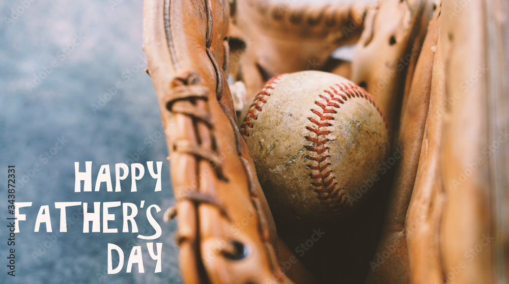 Baseball in ball glove with happy fathers day text on background. Stock  Photo