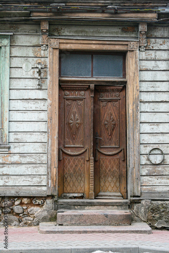 Very old rustic timber doors © Karlis