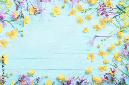 summer flowers on blue wooden background