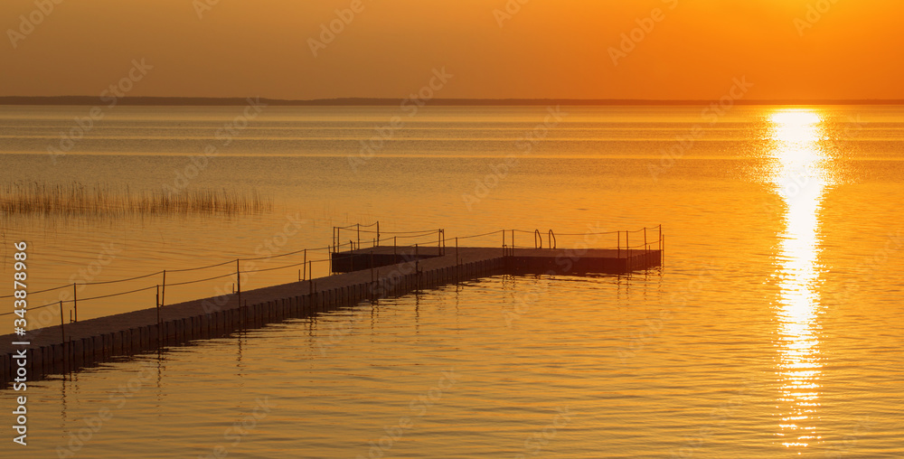 pontoon pier at beautiful summer sunset