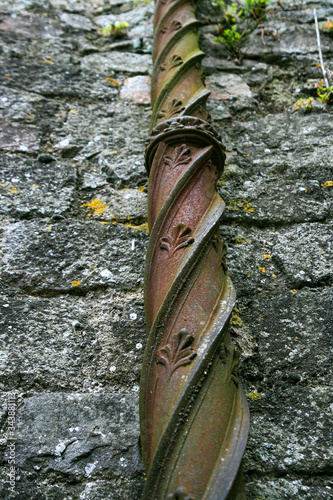 Old rustic metal rainwater pipe