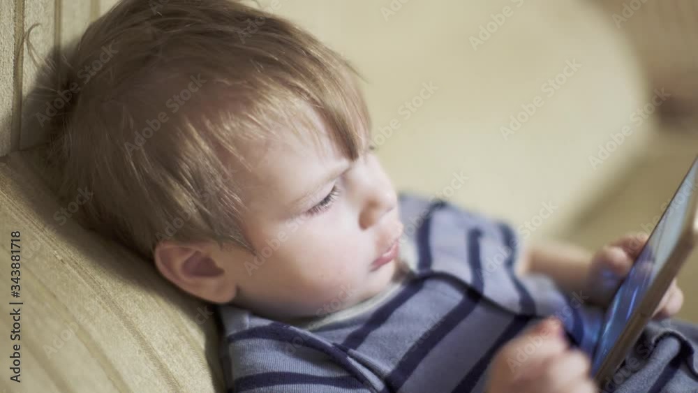 Boy playing with snot