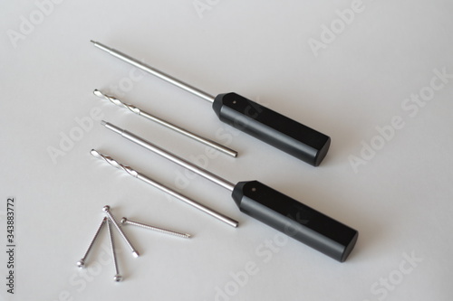 Surgical screwdrivers  and screws 
for operations in traumatology photo