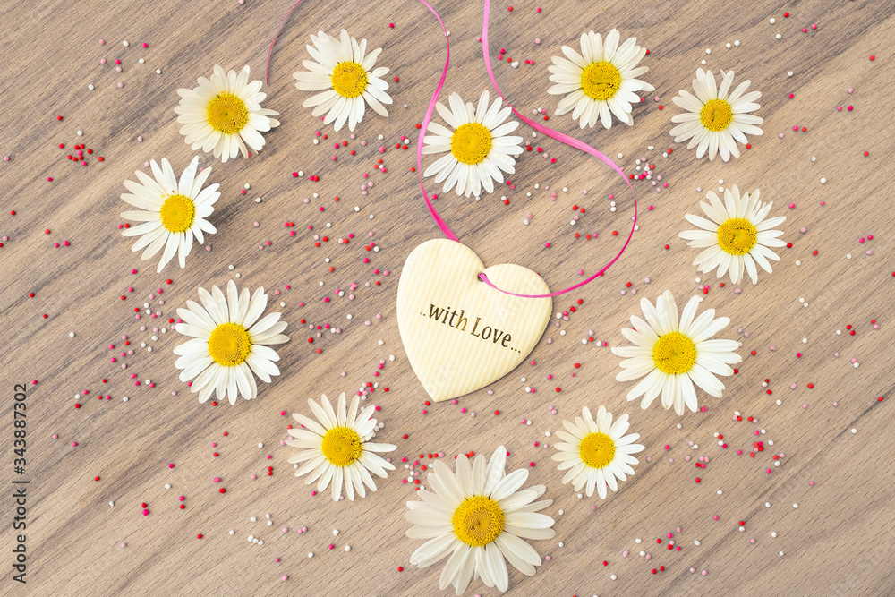 Obraz premium chamomile heart and the message with love