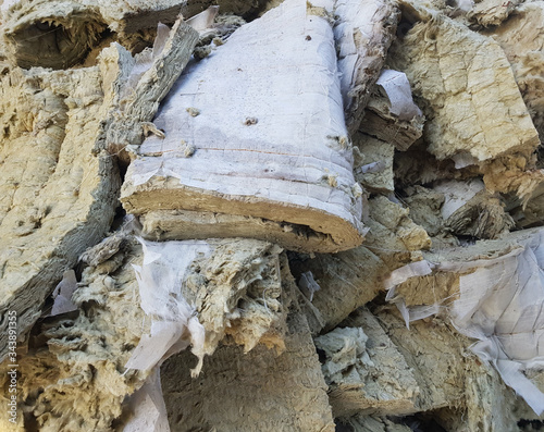 Used glass wool for insulation. Glass wool to insulate walls, pipes