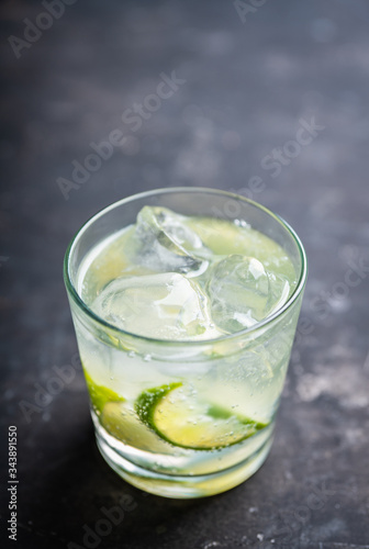 Wallpaper Mural Rum based cocktail caipirinha (variation of cuba libre) on the rustic background. Selective focus. Shallow depth of field. Torontodigital.ca