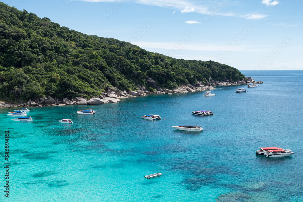 Scenery of boats in tropical sea with blue sky on Similan bay