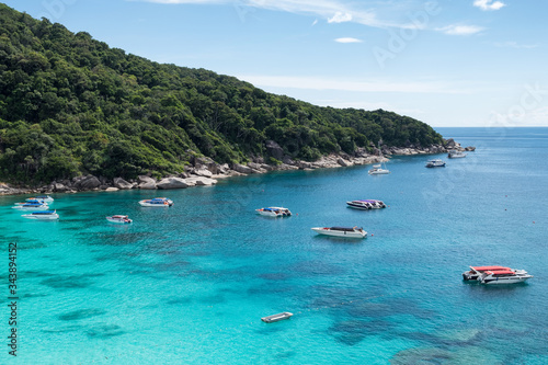 Scenery of boats in tropical sea with blue sky on Similan bay © Mumemories