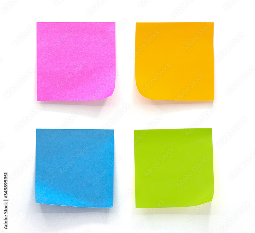 Collection of different colored sheets of note papers Isolated on white background