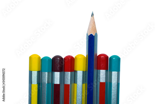 Eight different colored wooden pencil crayon placed in a row while one point backward