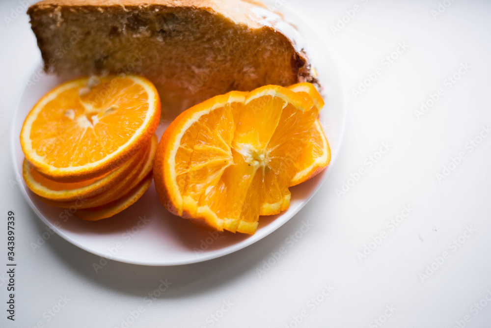 Sliced orange on a white plate