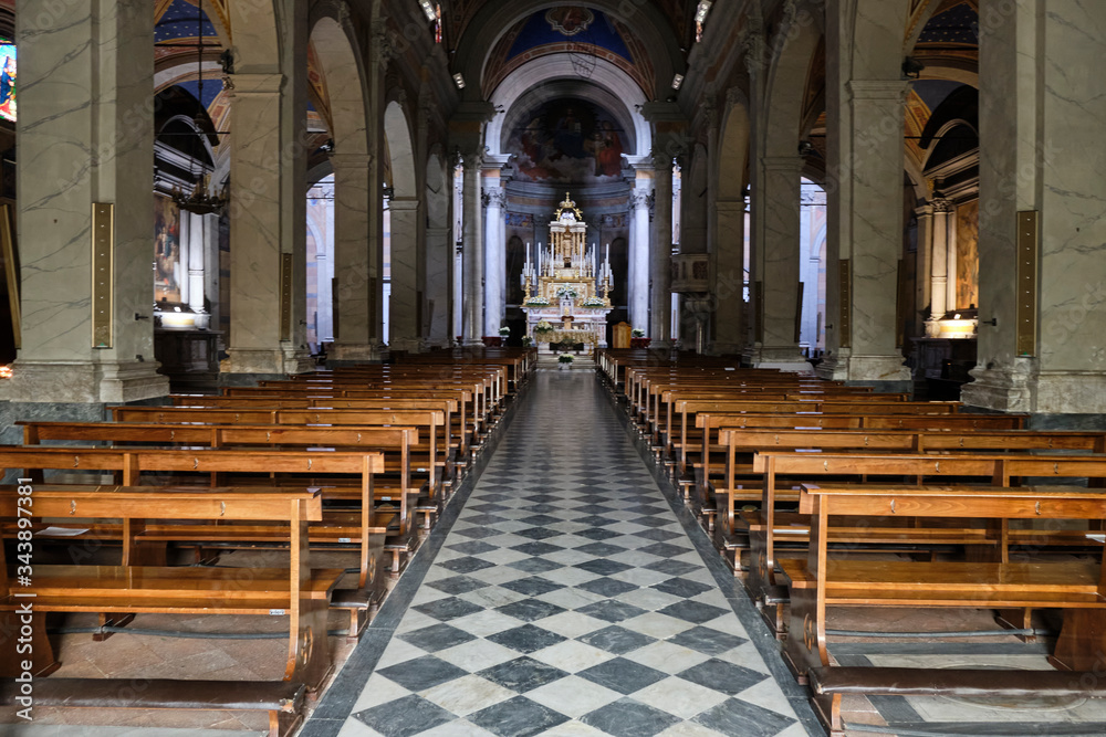 Fototapeta premium Church Pieve of Capannori, Solo Backpacker Trekking on the Via Francigena from Lucca to Siena. Walking between nature, history, churches,