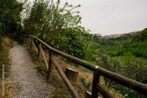 Path to San Miniato. Solo Backpacker Trekking on the Via Francigena from Lucca to Siena. Walking between nature, history, churches,