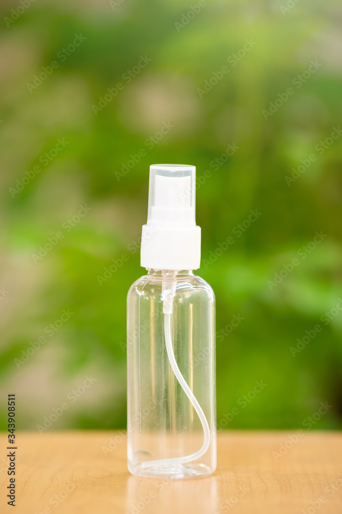 Plastic blank bottle on wooden table.