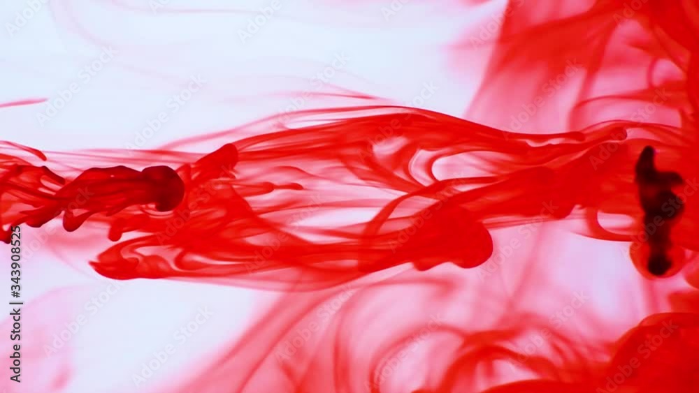 Ink color drops in the water with a white background