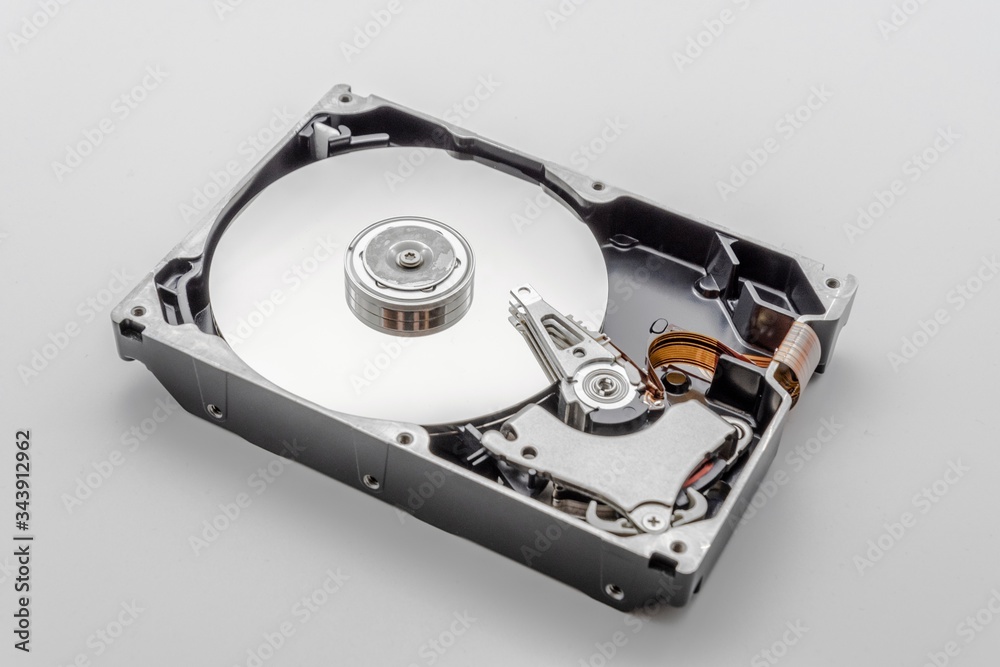 Close-up of mechanical hard disk disassembled Close-up of mechanical hard disk disassembled