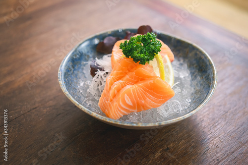 Salmon sashimi, raw salmon fish sliced in Japanese style.
