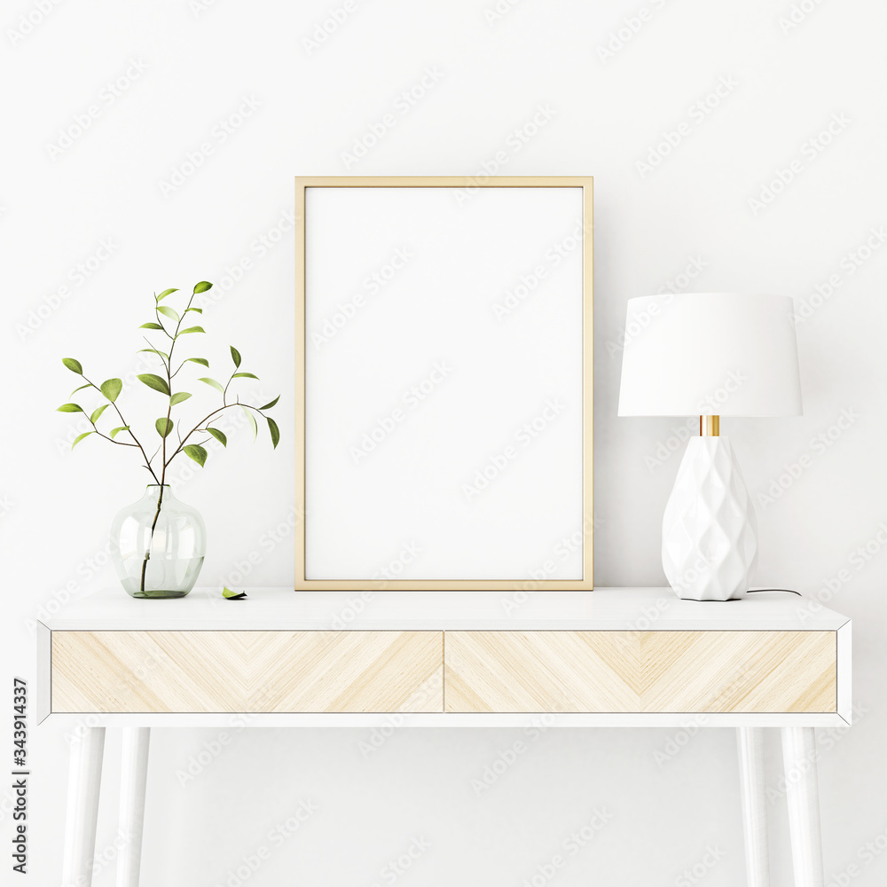 Interior poster mockup with vertical gold metal frame on the console table with green tree branch in vase and lamp on empty white wall background. A4, A3 size format. 3D rendering, illustration. Interior poster mockup with vertical gold metal frame on the console table with green tree branch in vase and lamp on empty white wall background. A4, A3 size format. 3D rendering, illustration.