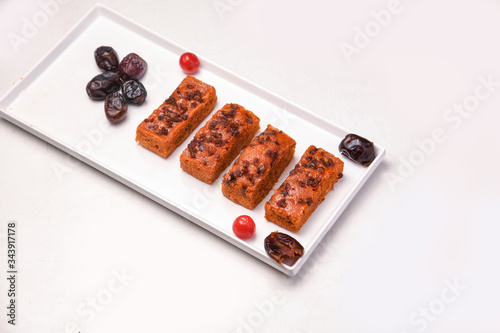cake in white tray with flavor of dates