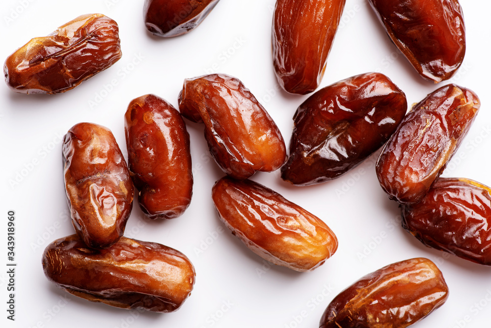 Royal, big dates on a white background, close-up, flat lay. Royal, big dates on a white background, close-up, flat lay.
