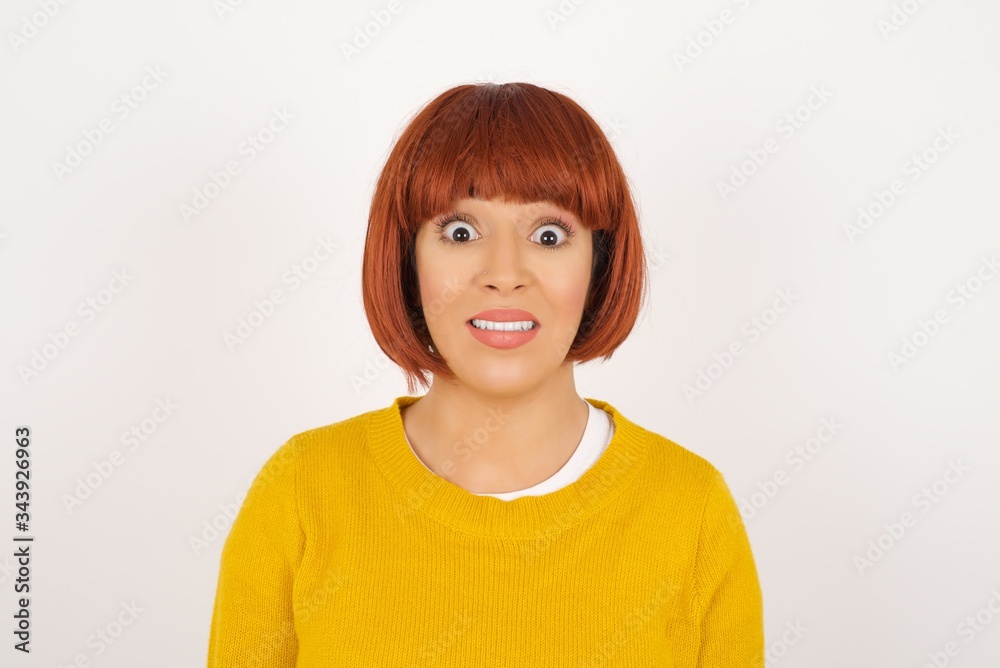 Young beautiful girl with an afro hairstyle having broad white smile being excited to meet Friends and go out to have a good day. Young beautiful girl with an afro hairstyle having broad white smile being excited to meet Friends and go out to have a good day.